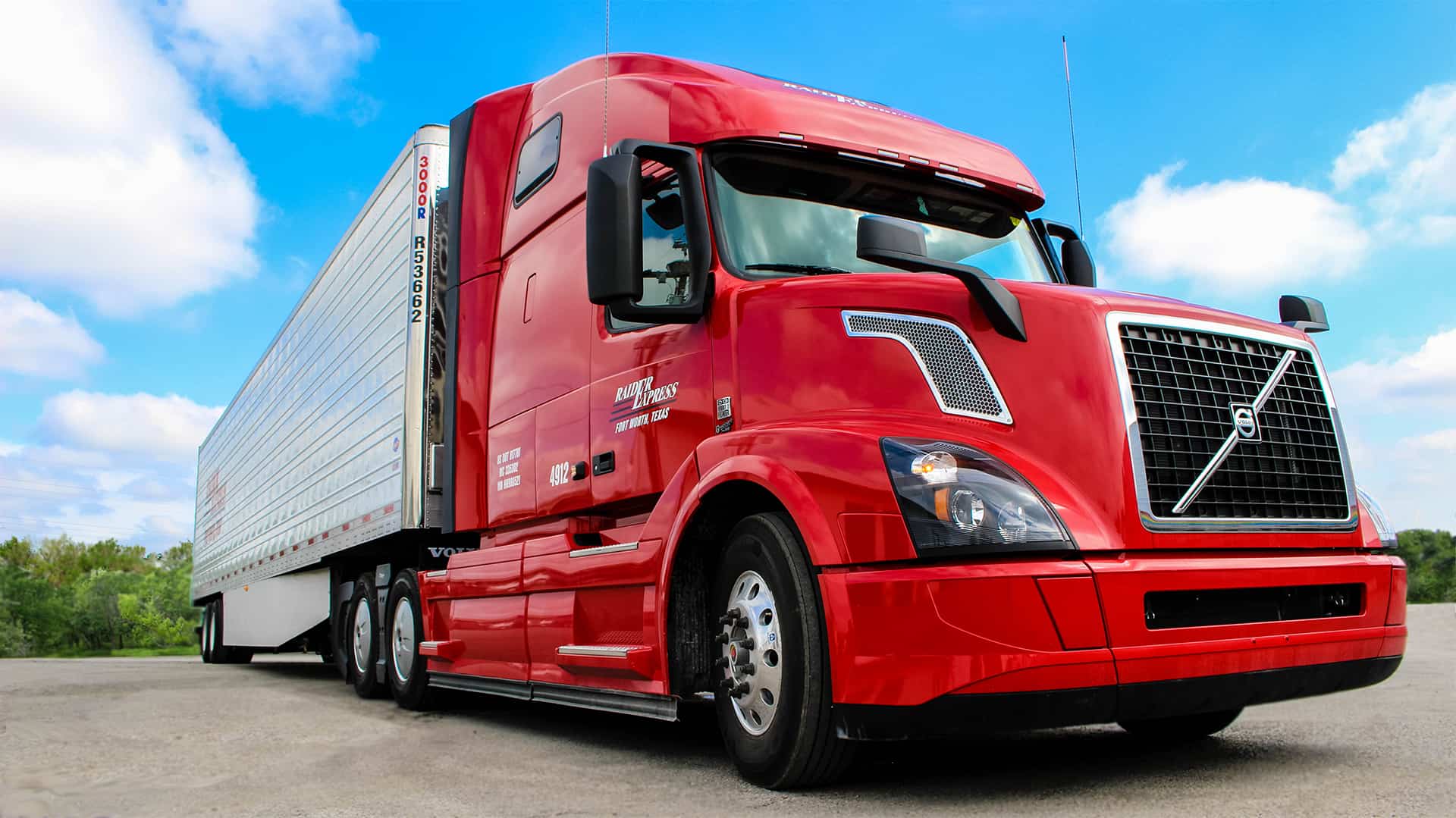 Raider Express refrigerated tractor-trailer on the highway